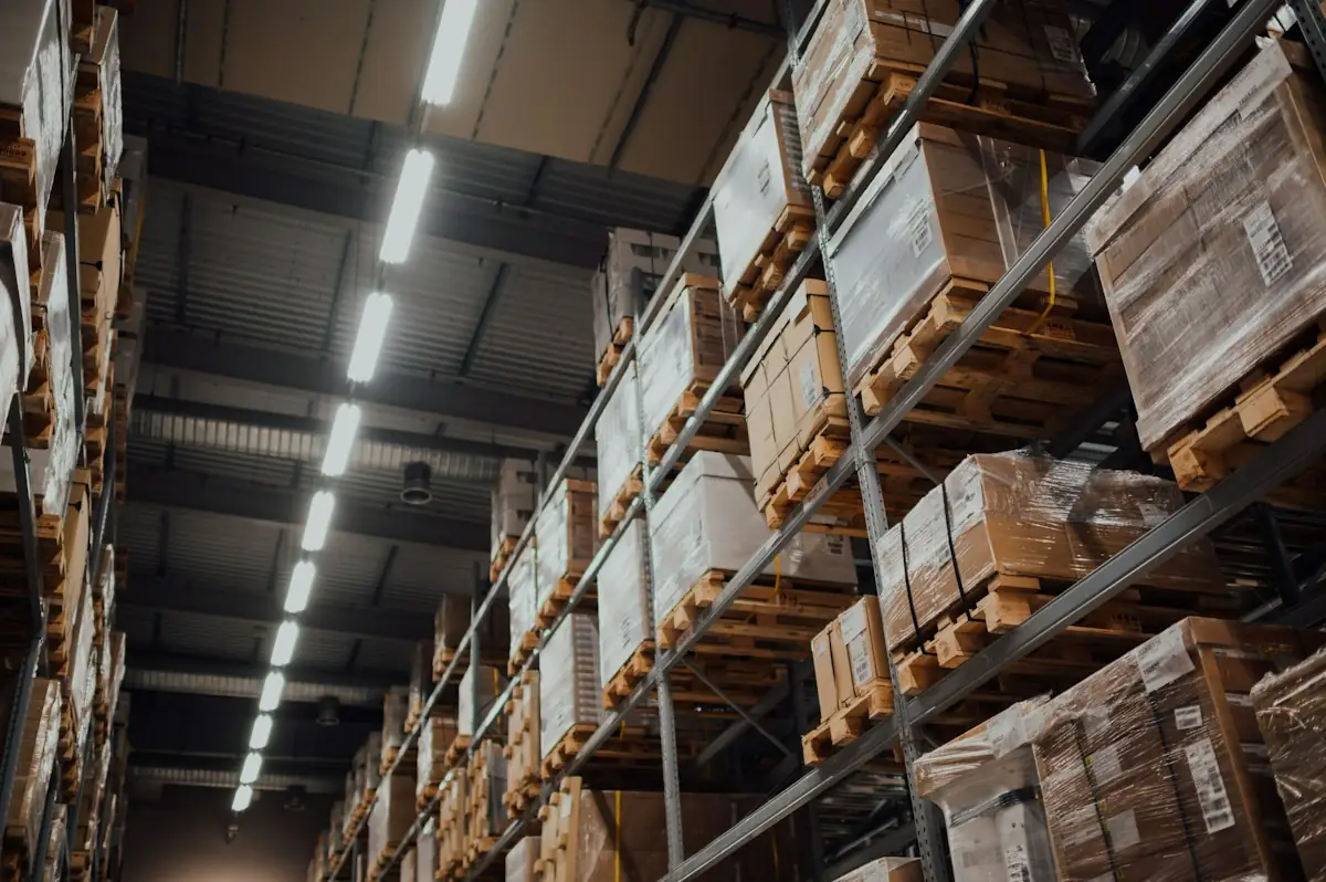 Warehouse aisle with cartons stacked on pallet racks