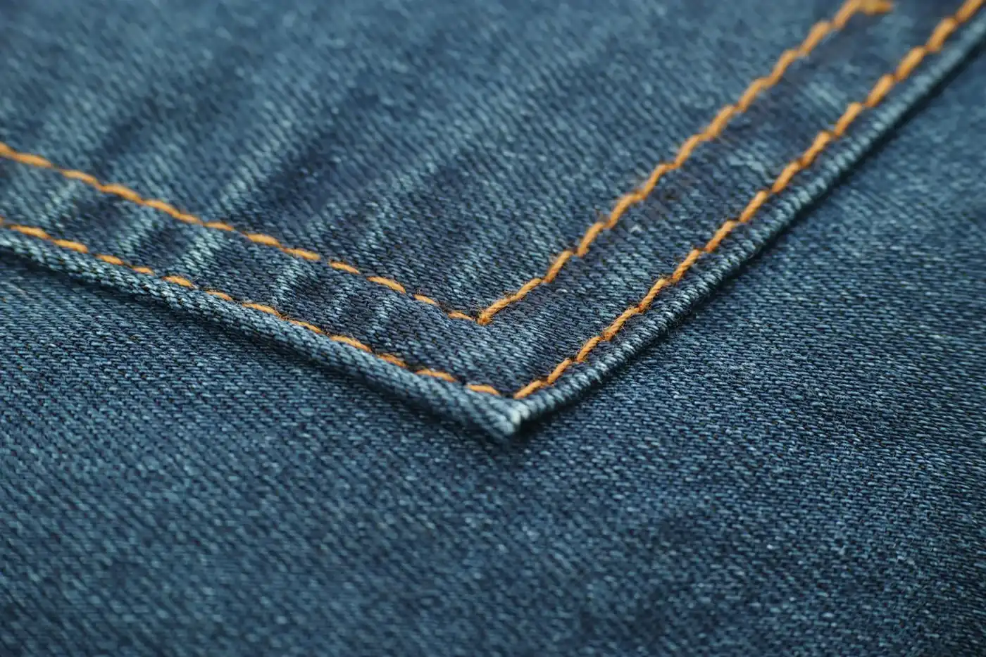 Close-up of double topstitching on blue denim