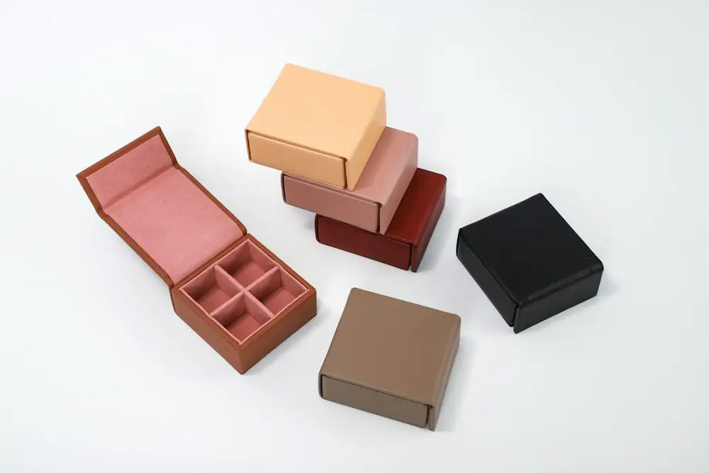 Open ring box with a ring inside on a wooden table